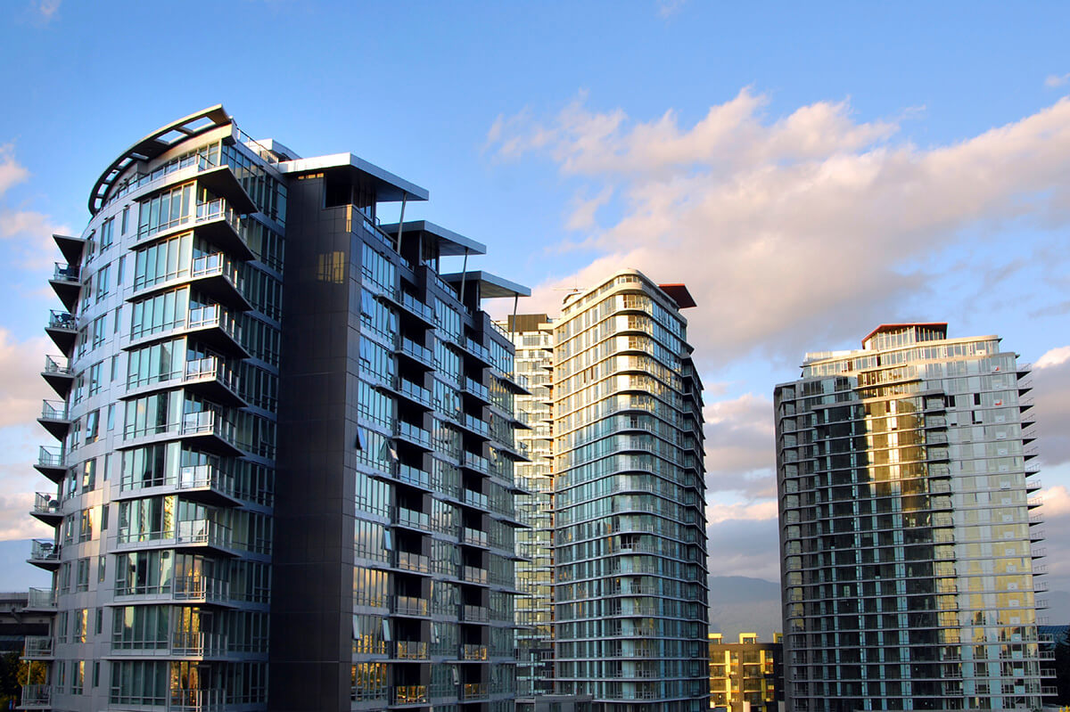 Commercial buildings with clouds